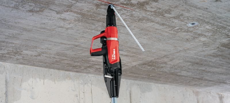 Sada s prachem poháněnou hřebíkovačkou DX 6 Plně automatická prachem poháněná hřebíkovačka – sada na stěny a bednění Použití 1