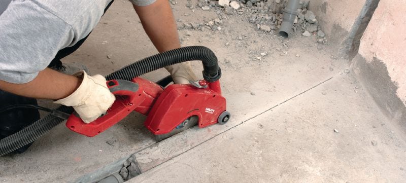 Elektrický řezač DCH 230 Elektrický ruční diamantový řezač pro suché řezání – řezání do hloubky 85 mm s 230mm kotoučem Použití 1