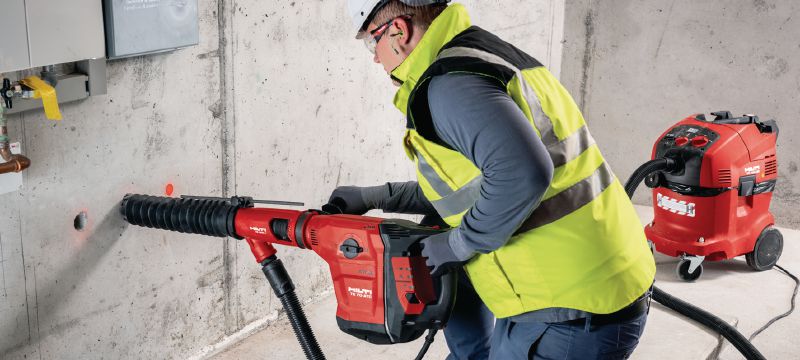 Kombinované kladivo TE 70-ATC/AVR Velmi výkonné kombinované kladivo SDS-Max (TE-Y) s nízkými vibracemi pro náročné vrtání a sekání do betonu Použití 1