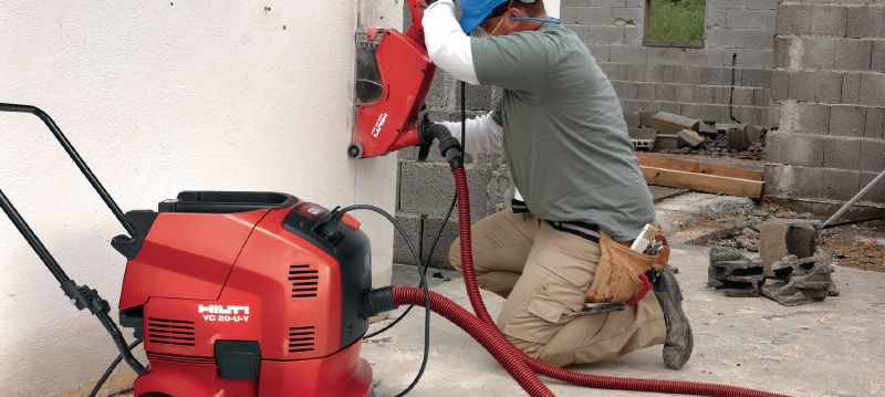 Elektrický řezač DCH 230 Elektrický ruční diamantový řezač pro suché řezání – řezání do hloubky 85 mm s 230mm kotoučem Použití 1