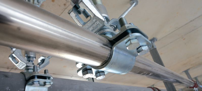 MFP-F Potrubní objímka pro použití s pevnými body Žárově pozinkovaná (HDG – Hot-Dip Galvanized) potrubní objímka s pevným bodem s maximální výkonností při použití v těžce namáhaných konstrukcích Použití 1