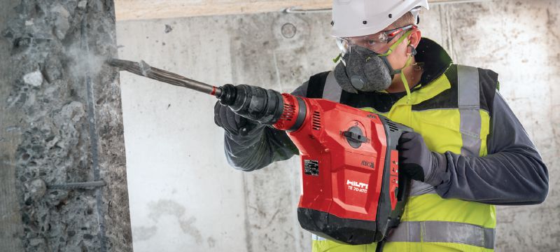 Kombinované kladivo TE 70-ATC/AVR Velmi výkonné kombinované kladivo SDS-Max (TE-Y) s nízkými vibracemi pro náročné vrtání a sekání do betonu Použití 1