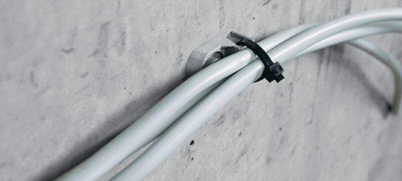Kabelová příchytka X-ECT MX Plastová příchytka kabelů/potrubí pro použití s páskovanými hřeby Použití 1
