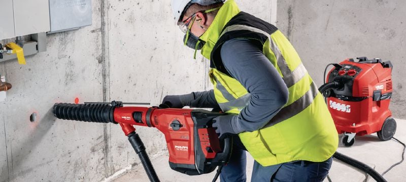 Kombinované kladivo TE 70-ATC/AVR Velmi výkonné kombinované kladivo SDS-Max (TE-Y) s nízkými vibracemi pro náročné vrtání a sekání do betonu Použití 1